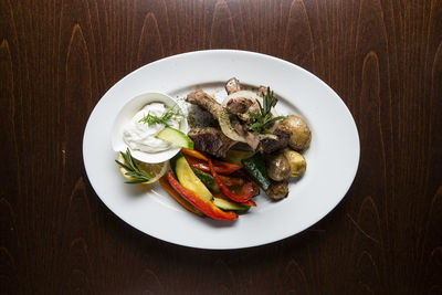 High angle view of food served on table