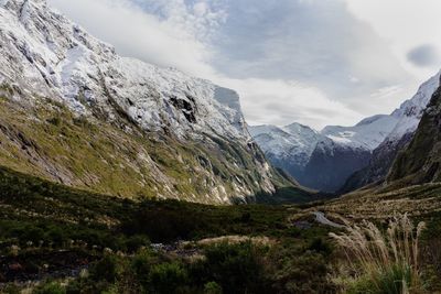 Scenic view of snowcapped mountains against sky