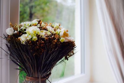 Close-up of flower vase on table