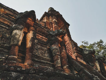 Low angle view of old temple against clear sky