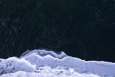 Full frame shot of snow covered land