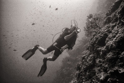 Man scuba diving in sea