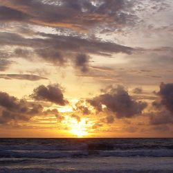 Scenic view of sea at sunset