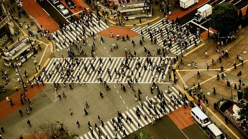 High angle view of crowd crossing road