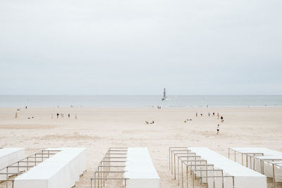 Scenic view of beach against clear sky