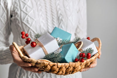 Close-up of man holding basket