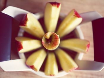 High angle view of apple slices arranged on plate