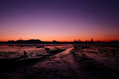 View of beach at sunset