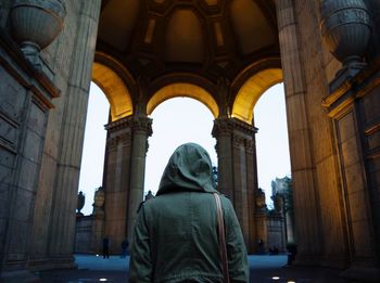 Person standing at palace of fine arts