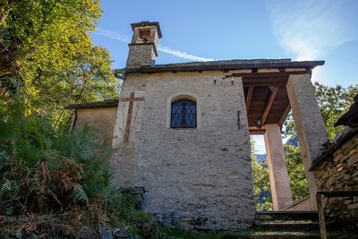 Low angle view of old building against sky