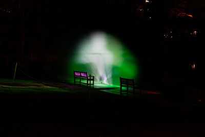 View of illuminated sign at night