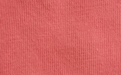 Full frame shot of red woolen fabric