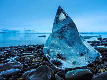 Close-up of stones on beach