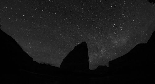 Low angle view of stars in sky at night