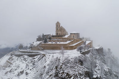 Senhora da graca church drone view with snow in mondim de basto, portugal