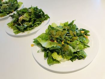 High angle view of vegetables in plate on table