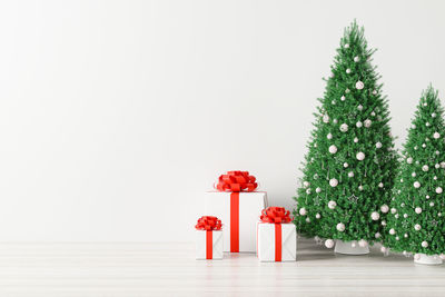 Red christmas tree against white background