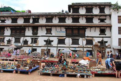 Group of people in front of building