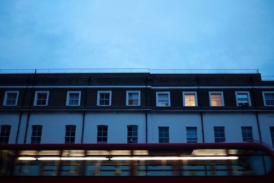 Low angle view of building against blue sky