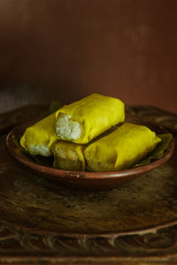 Close-up of fruits in plate on table