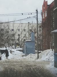 View of city against sky during winter