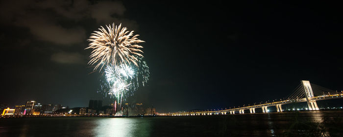 Firework display at night