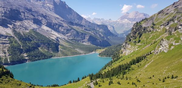 Panoramic view of lake and mountains against sky