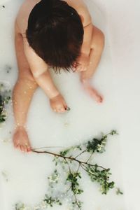 Close-up of baby in bathroom