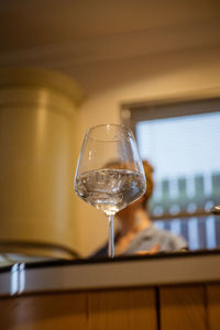 Close-up of wine in glass on table