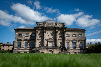 Low angle view of old building against sky