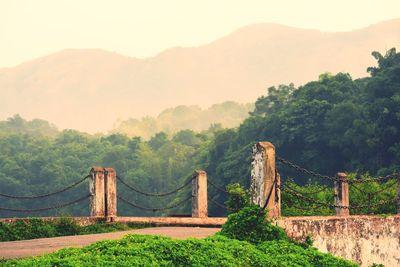 View of bridge over mountain against sky