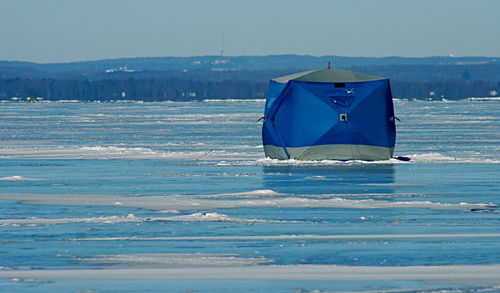 Ice fishing tent on frozen lake simcoe