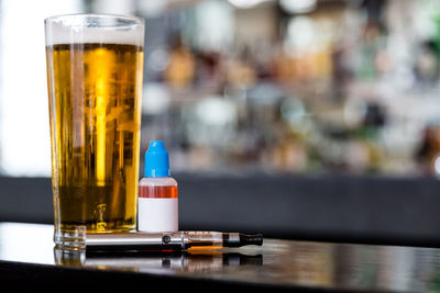 Close-up of beer bottle on table