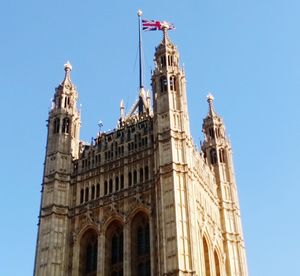 Low angle view of historical building against clear blue sky