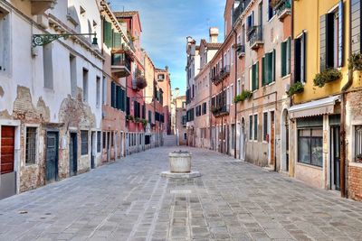 Alley amidst buildings in town