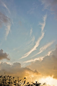 Scenic view of landscape against sky at sunset