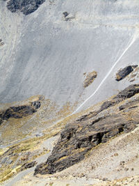 High angle view of road along rocks