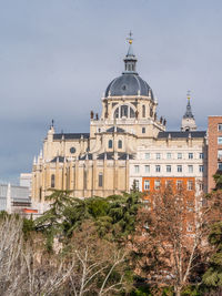 Exterior of buildings against sky in city