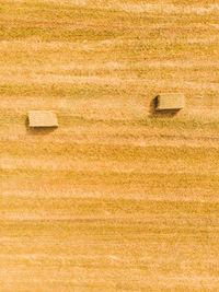 Aerial view of bales of straw. aerial view of field