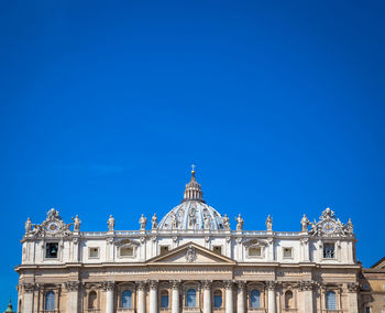 Low angle view of building against blue sky