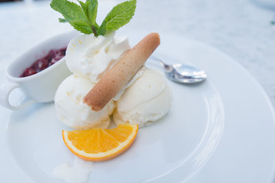 High angle view of fresh ice cream served in plate on table