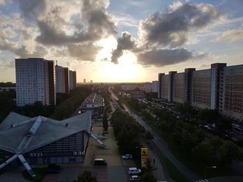 High angle view of buildings against sky during sunset