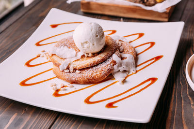 High angle view of ice cream in plate on table