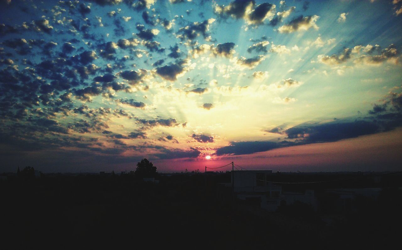 sunset, silhouette, sky, scenics, beauty in nature, cloud - sky, tranquil scene, tranquility, orange color, idyllic, nature, dramatic sky, cloud, dark, landscape, built structure, dusk, outdoors, building exterior, cloudy