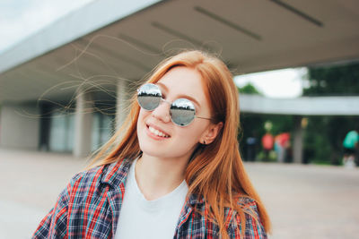 Close-up of female student wearing sunglasses