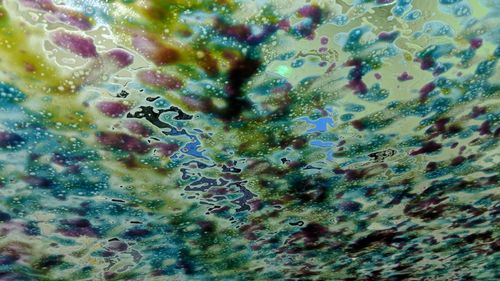 Full frame shot of sea seen through glass window