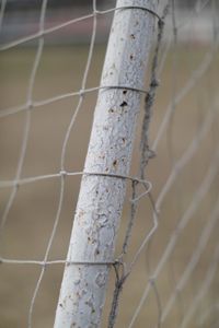 Close-up of snow on metal during winter