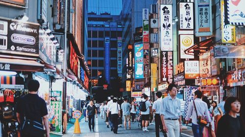 People walking on city street