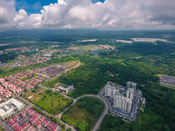 High angle view of city buildings against sky