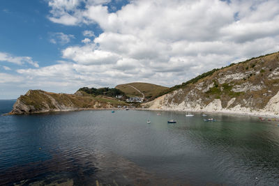 Landscape photo of lulworth cove in dorset.